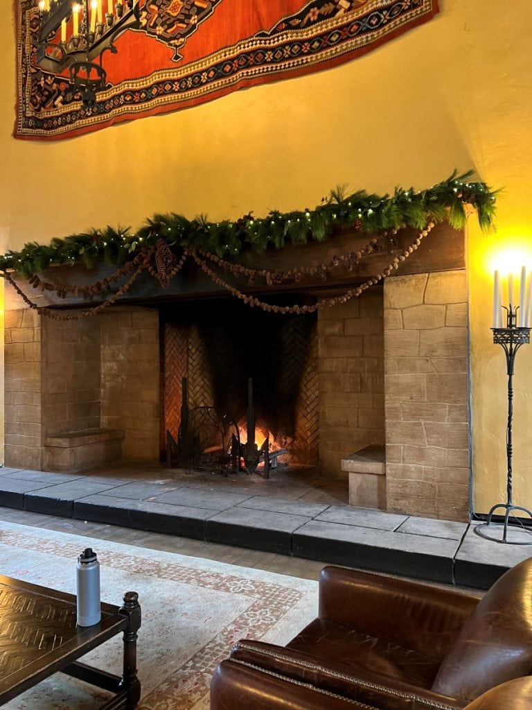 Grand fireplace with benches on the side to sit