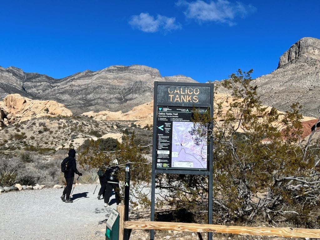 Hikers at the trailhead of Calico Tanks trail at Red Rock Canyon