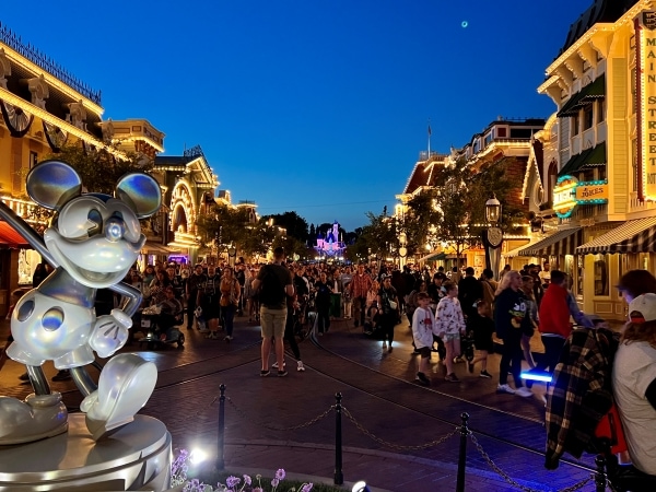 Evening at Disneyland - View of Main Street USA with Mickey's statue 