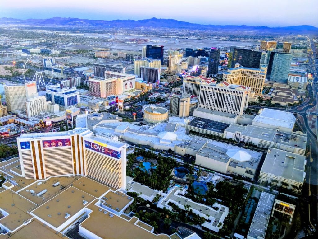 Aerial view of Las Vegas Strip area and Casino resorts and the Nevada landscape in the back
