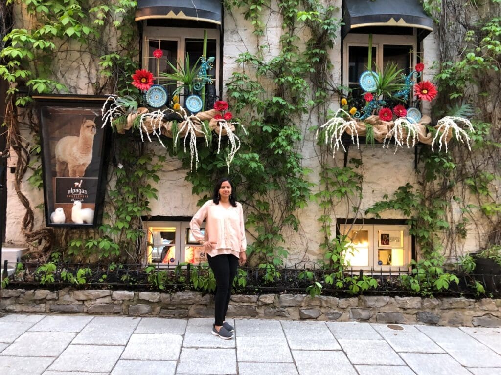 Me posing in front of a pretty building in Quebec City