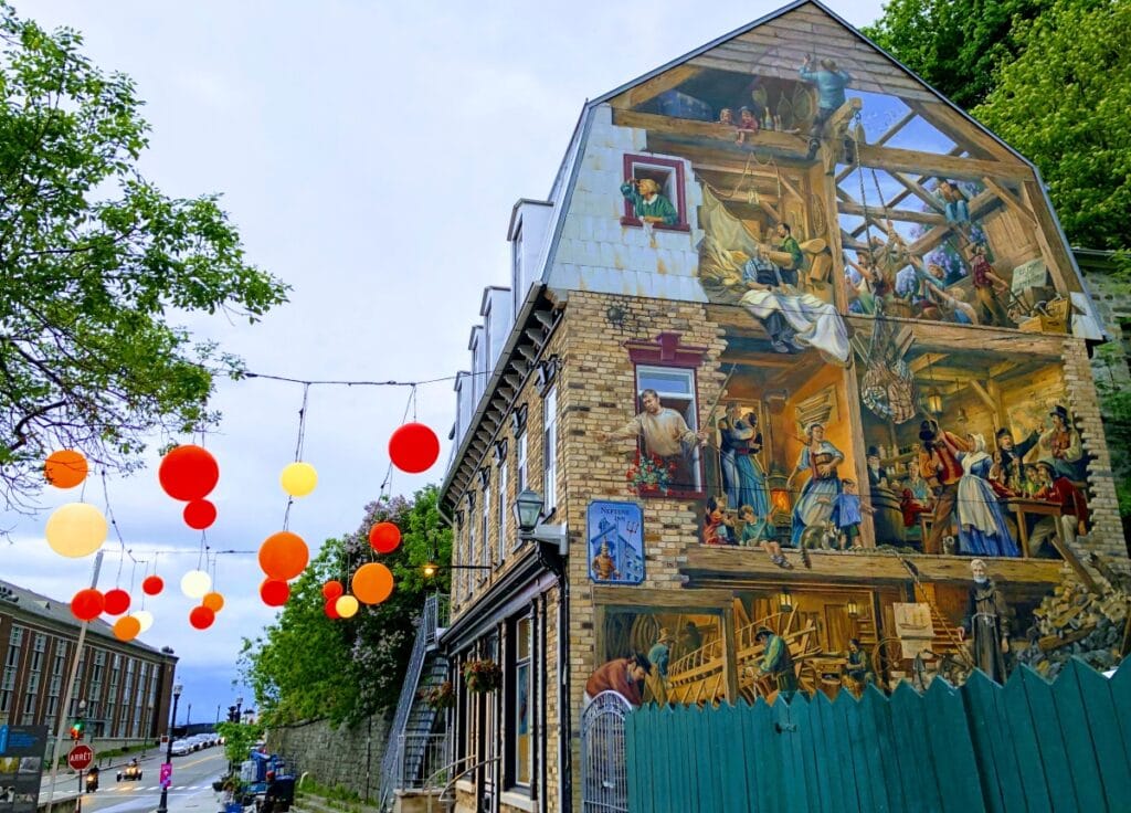 A detailed mural on the building of Neptune Inn