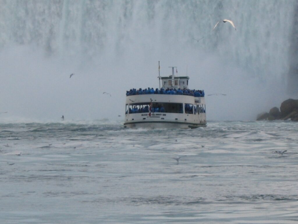 A cruise boat at the base of Niagara Falls