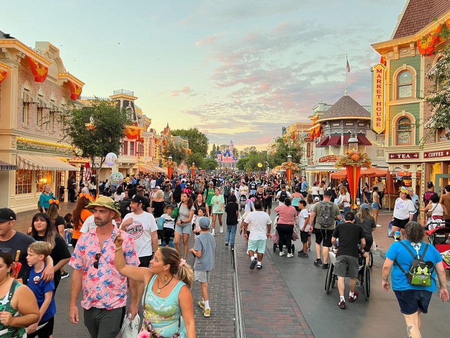 people walking on Disneyland main street USA