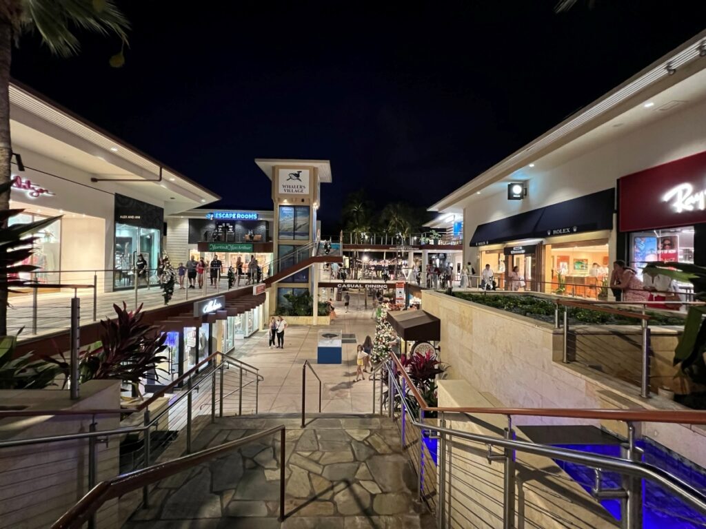 Open-air shopping mall with a sign that reads Whalers Village
