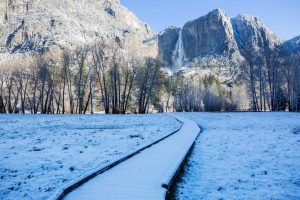 Yosemite valley floor and boardwalk covered with snow